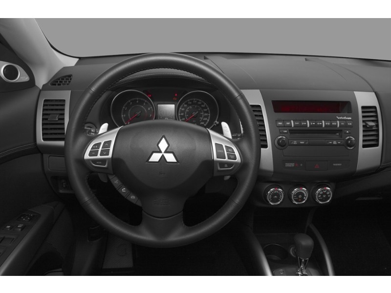 RALLY RED METAL 2010 Mitsubishi Outlander 2WD 4dr ES interior